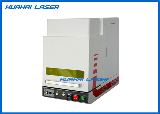 China Full Enclosure Fiber Laser Marking Machine With Rotary Fixture For Jewelry Rings Bangles supplier